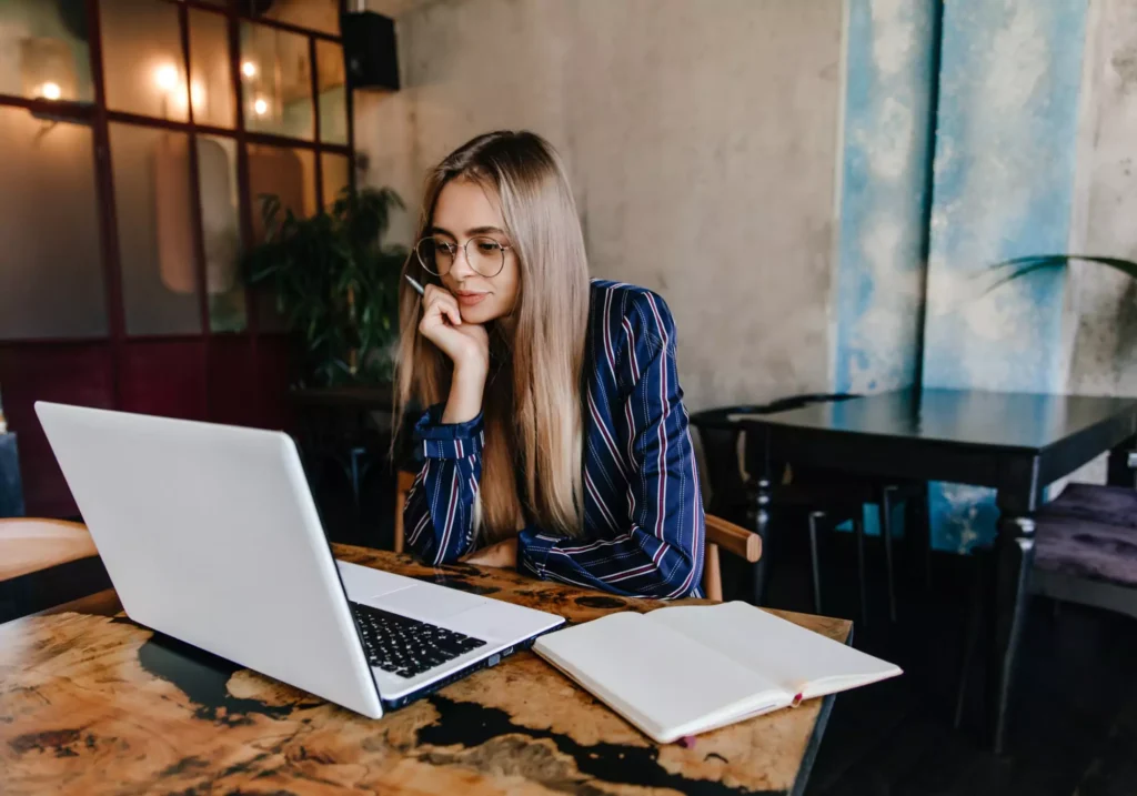 Freelancer working on a laptop to make money online from home in 2025